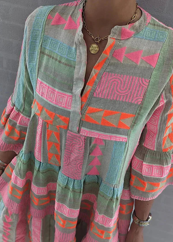 Vestido corto mujer | estampado geométrico y falda en capas