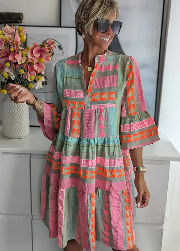 Vestido corto mujer | estampado geométrico y falda en capas